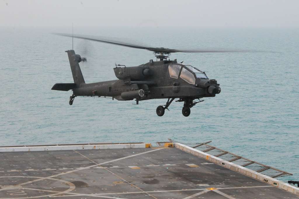 The ah 64d longbow apache lands aboard the uss new 6a82bd